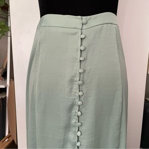 Sage green A-line maxi skirt with covered buttons
